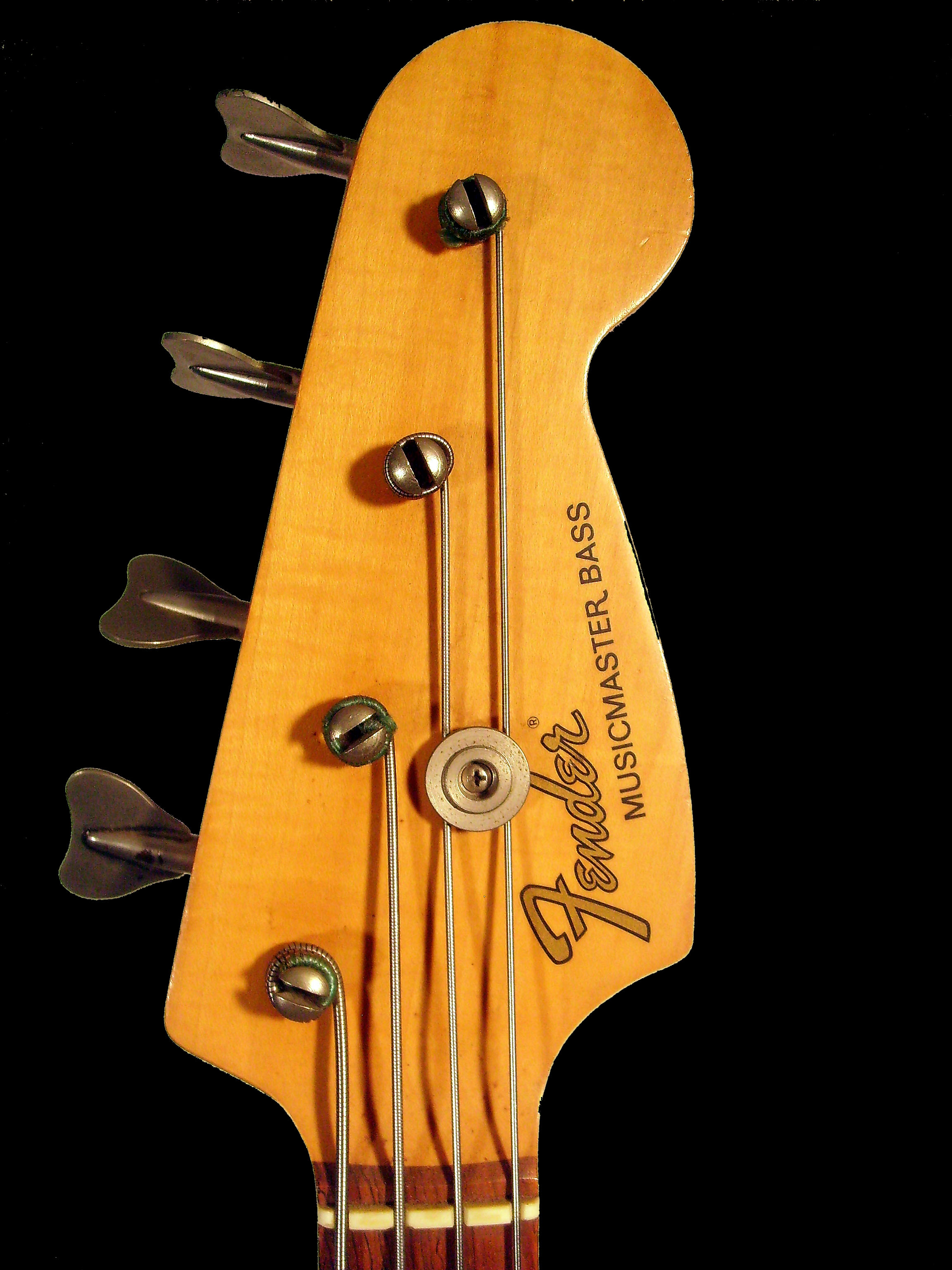 img/vintage/675/Fender_Musicmaster_Bass_1995_tortoise_peghead front2.jpg